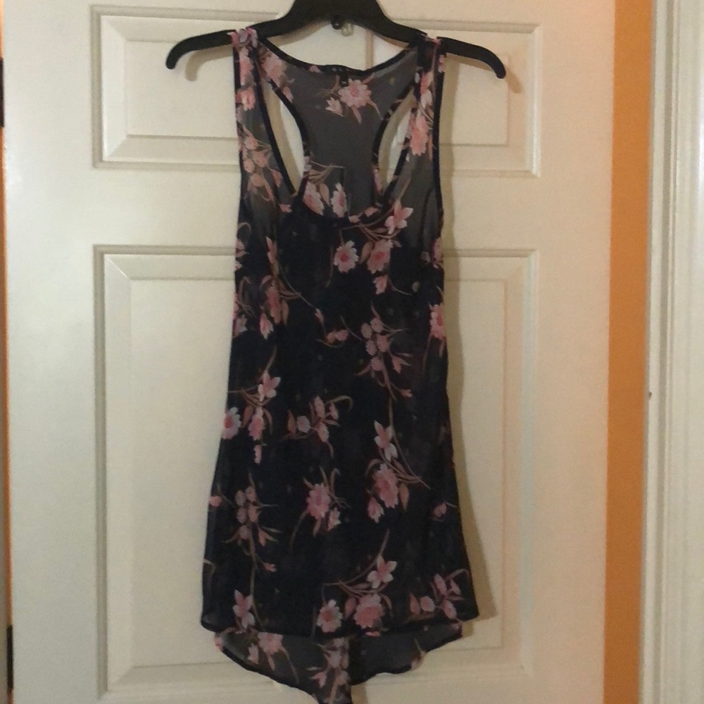 Sheer, floral racer back tank with shirttail hem
